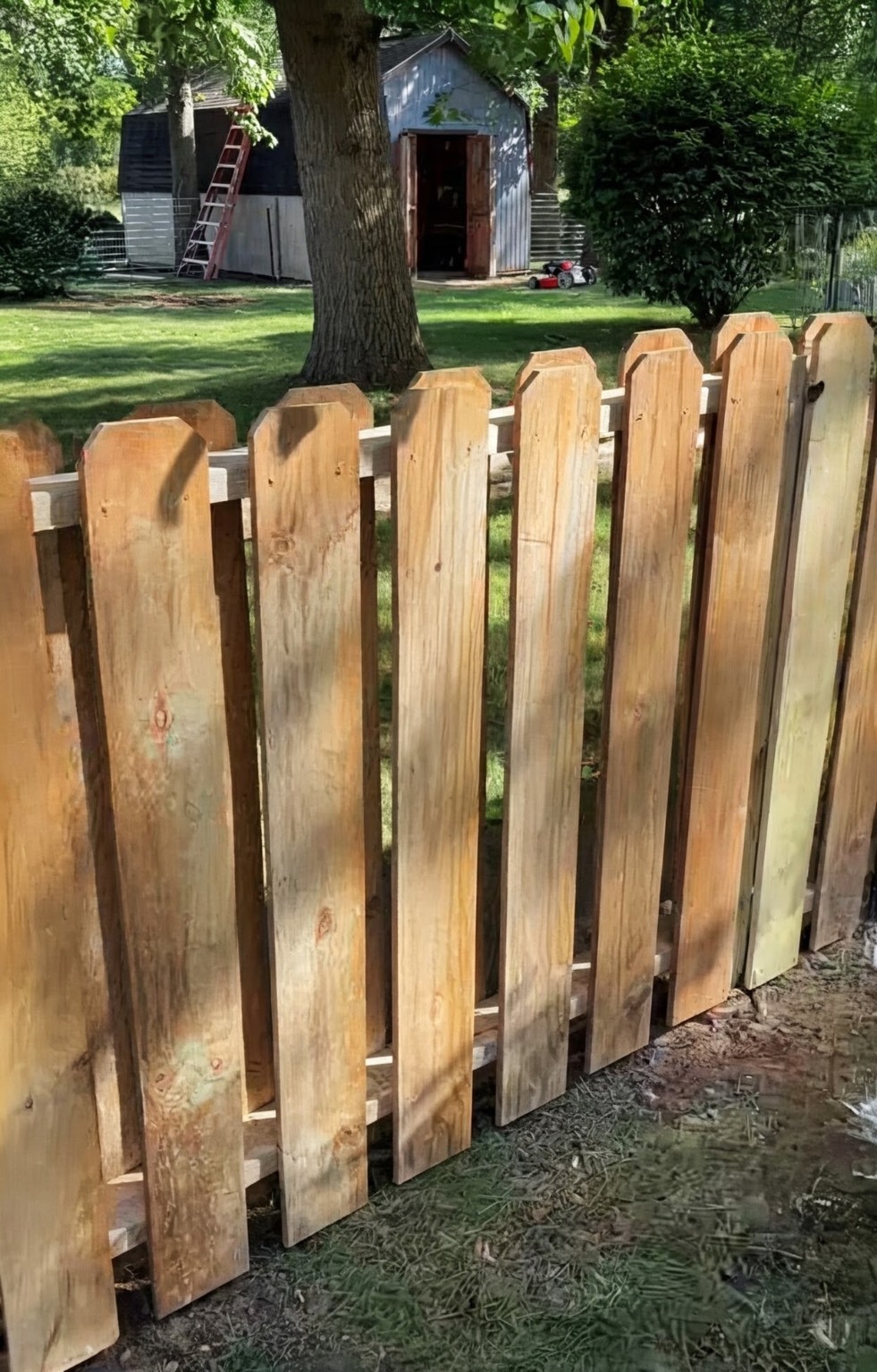 Wood shadowbox fence installed by Pitboss