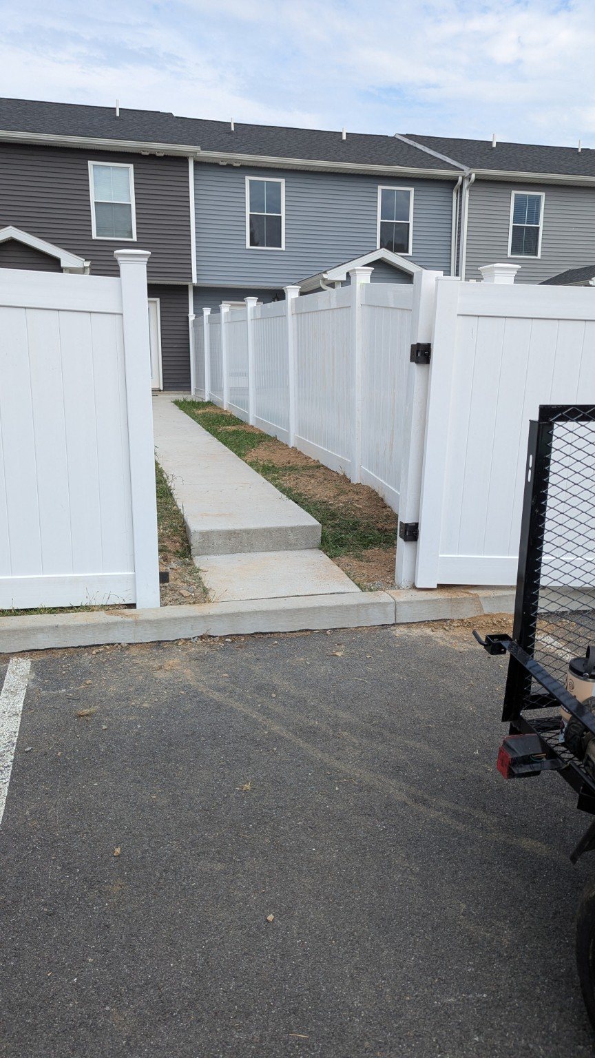 Finished white vinyl privacy fence gate
