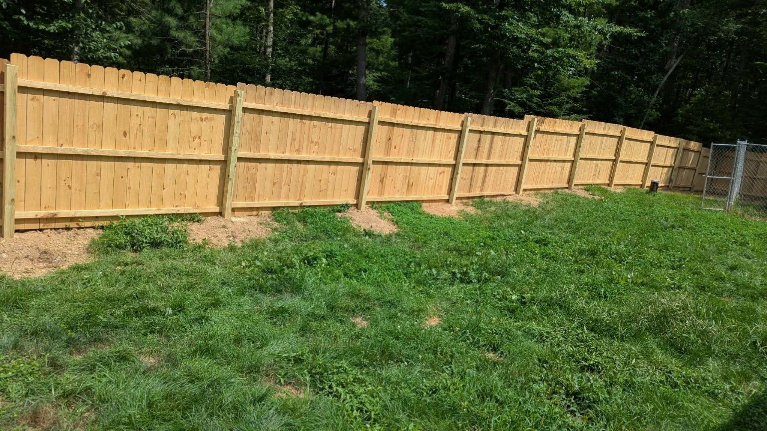 Completed Pitboss wood privacy fence installation