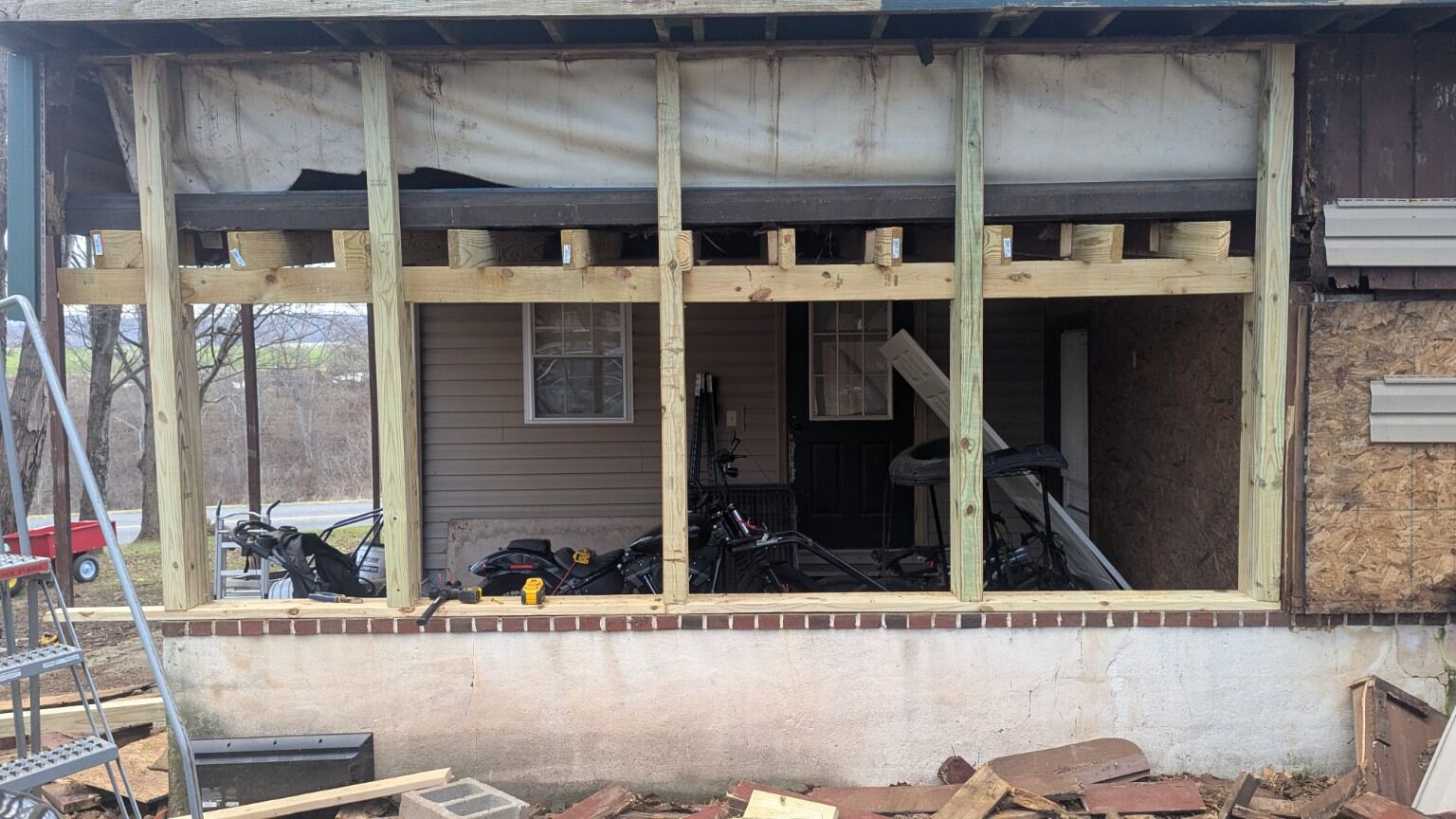 Porch structural framing replacement in progress
